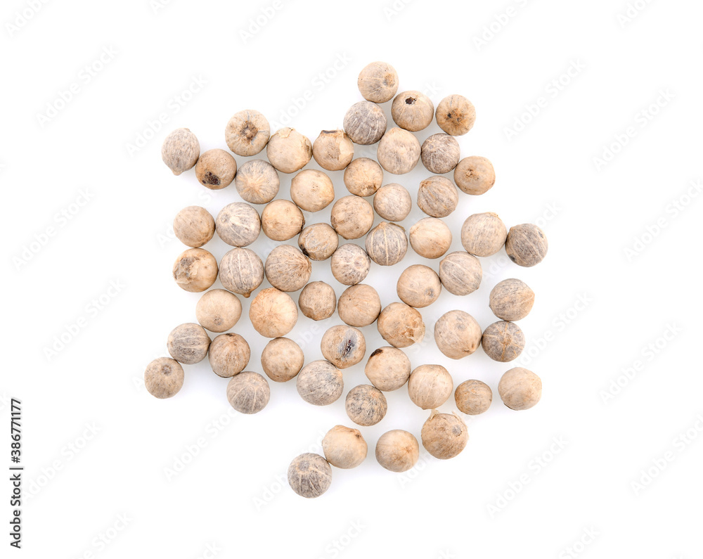 Top view of white peppers on the white background. Top view of white peppers on the white background.