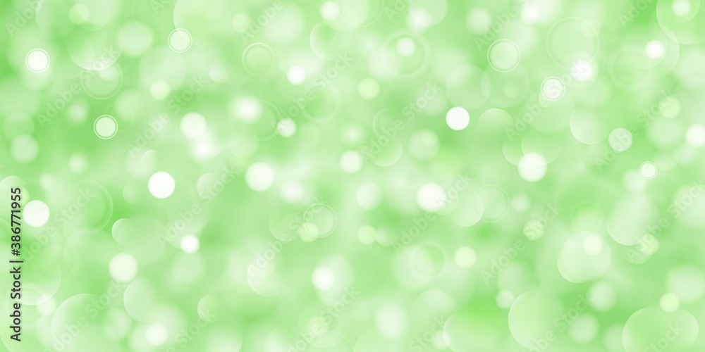 Abstract background of big and small translucent circles in green colors with bokeh effect Abstract background of big and small translucent circles in green colors with bokeh effect