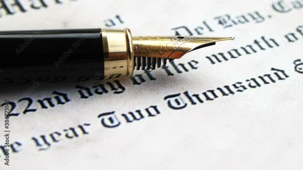 Fountain pen on marriage certificate dolly shot. Fountain pen on marriage certificate dolly shot.
