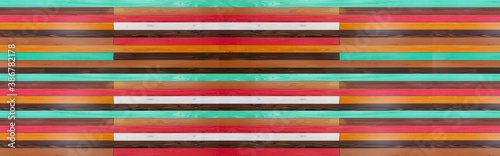 Panorama of Vintage multi-colored wooden wall pattern and seamless background