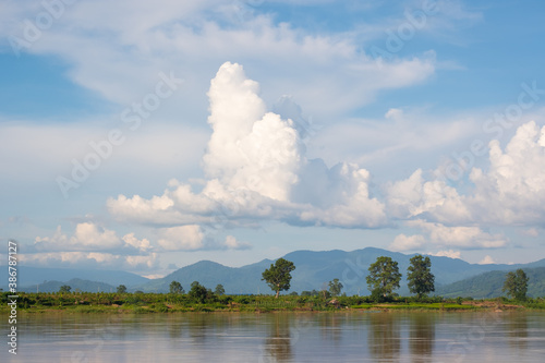 The sky has clouds and the Mekong River.