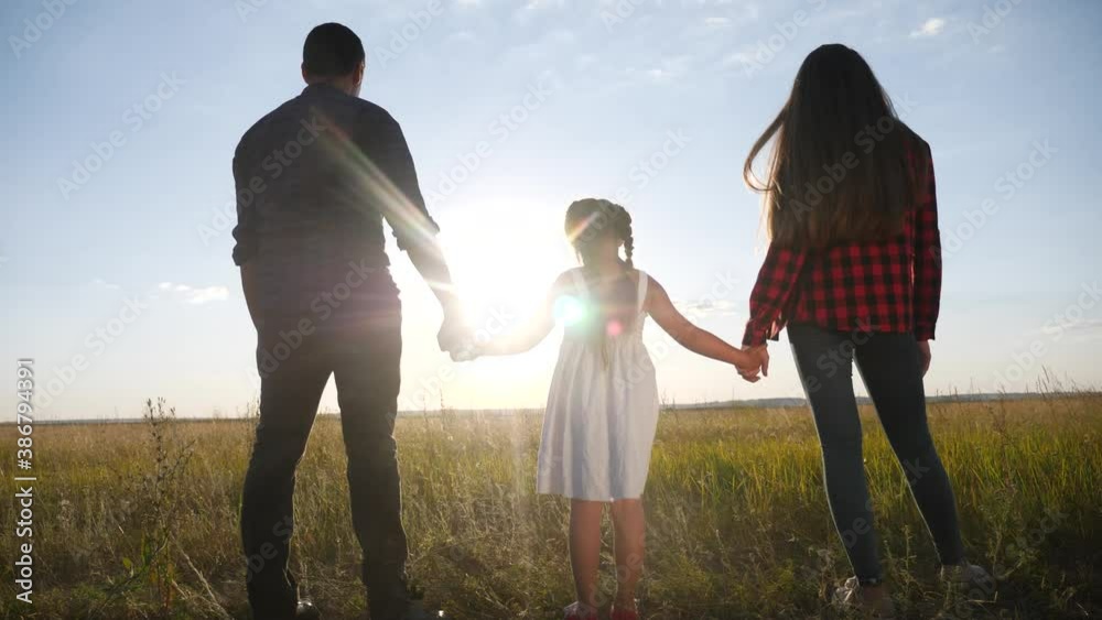 happy family parent hold holding kid daughter hand. mother and girl kid together hands at sunset. parent girl and child kid hold hands dream concept. happy family fun mother day concept happy family parent hold holding kid daughter hand. mother and girl kid together hands at sunset. parent girl and child kid hold hands dream concept. happy family fun mother day concept