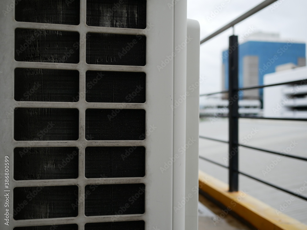air conditioner compressor outside building. air conditioner compressor outside building.