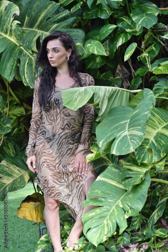 Portrait of beautiful young woman in the autumn nature