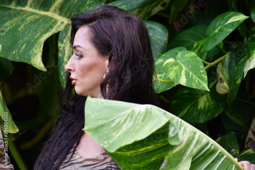 Beautiful girl inhale the aroma of summer