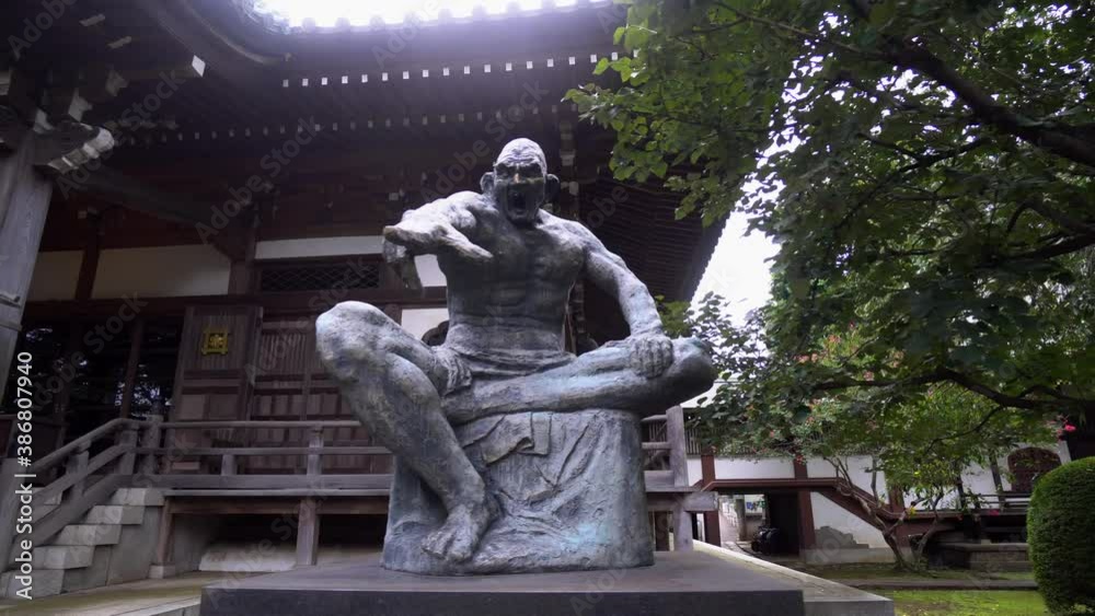 In many Buddhist temples in Japan there are various sculptures of different deities of that religion. Here is a very particular sculpture and a beautiful architectural design of his building.