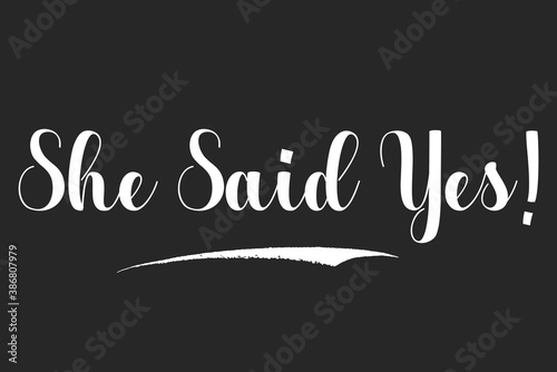 She Said Yes! Bold Calligraphy White Color Text On Dork Grey Background