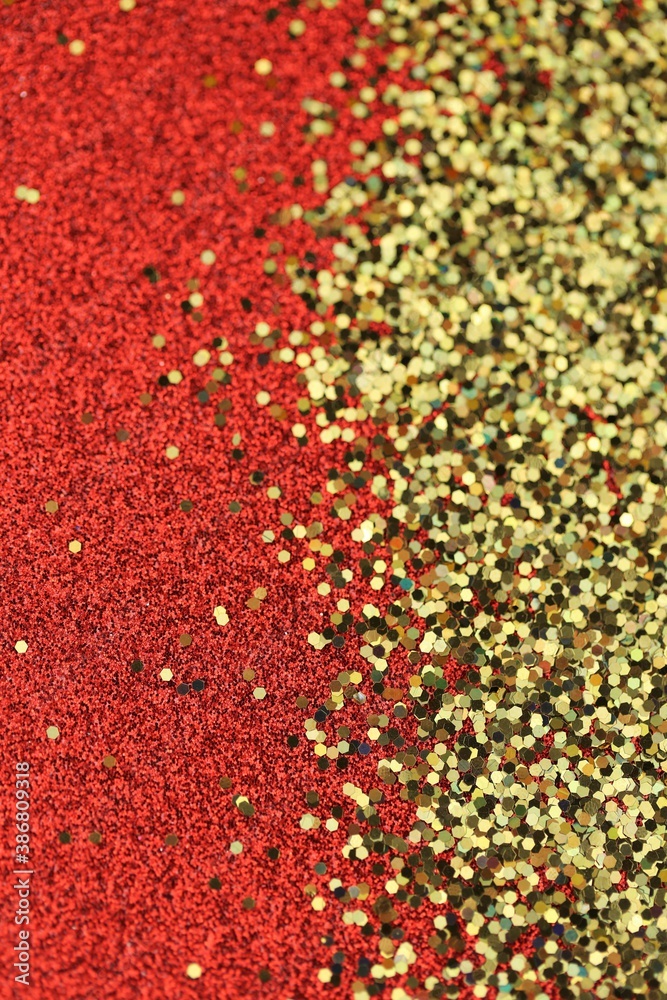 Christmas shining red gold glitter background.Shiny holiday texture. Wallpaper phone shining glitter.New Year and Christmas background. glitter macro background with shining bokeh Christmas shining red gold glitter background.Shiny holiday texture. Wallpaper phone shining glitter.New Year and Christmas background. glitter macro background with shining bokeh