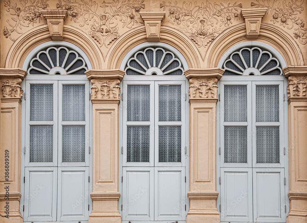 Old Phuket Sino Portuguese house classic facade with stuccowork in Phuket Old town area. Thailand