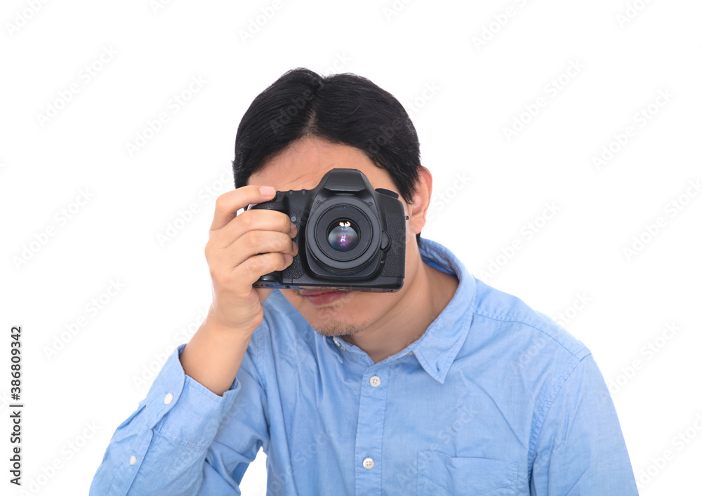 Male photographer holding a camera to take pictures in front of white background Male photographer holding a camera to take pictures in front of white background