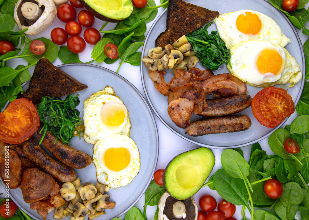 Fried eggs and bacon with a serve of spinach mushrooms and toast Fried eggs and bacon with a serve of spinach mushrooms and toast
