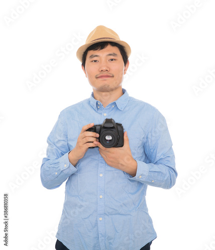 Young stylish Chinese photographer holding a camera