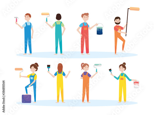 professional workers, craftsmen to paint wall roller bucket and brush remodeling