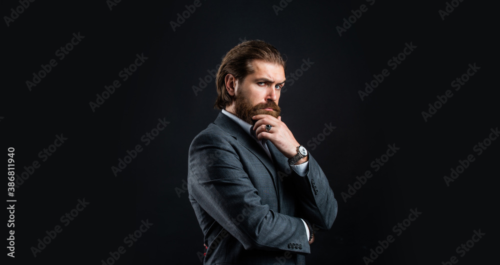 official office lifestyle. serious bearded man. handsome and successful man in expensive suit. He is in shirt. stylish successful man in suit posing. business man wear suit. illusionist