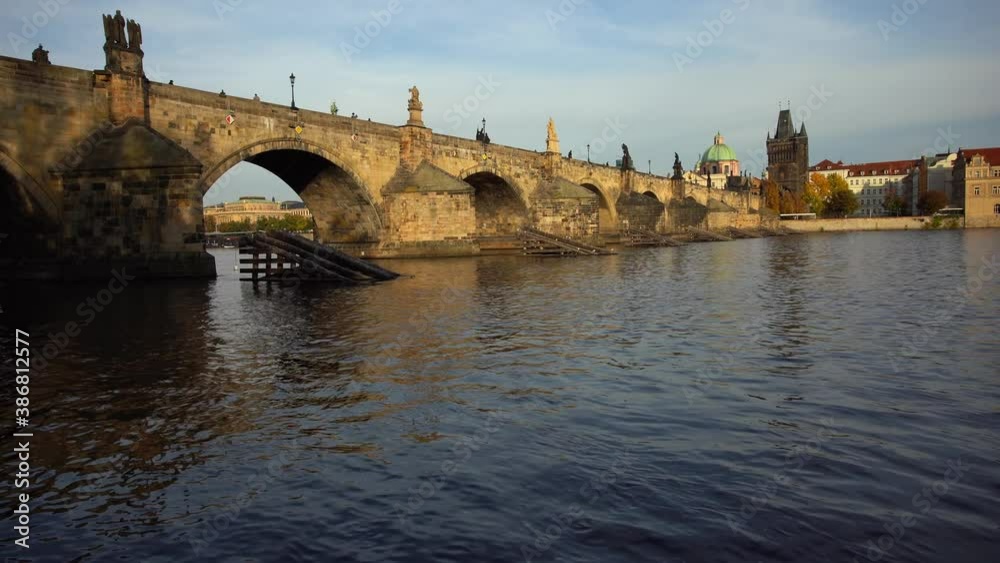 the old stone Charles Bridge from 1402 and the bank of the Vltava river in the center of the old town in Prague in the Czech Republic
the old stone Charles Bridge from 1402 and the bank of the Vltava river in the center of the old town in Prague in the Czech Republic