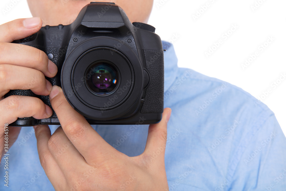 Photographer using SLR camera to take pictures Photographer using SLR camera to take pictures