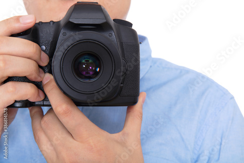 Photographer using SLR camera to take pictures