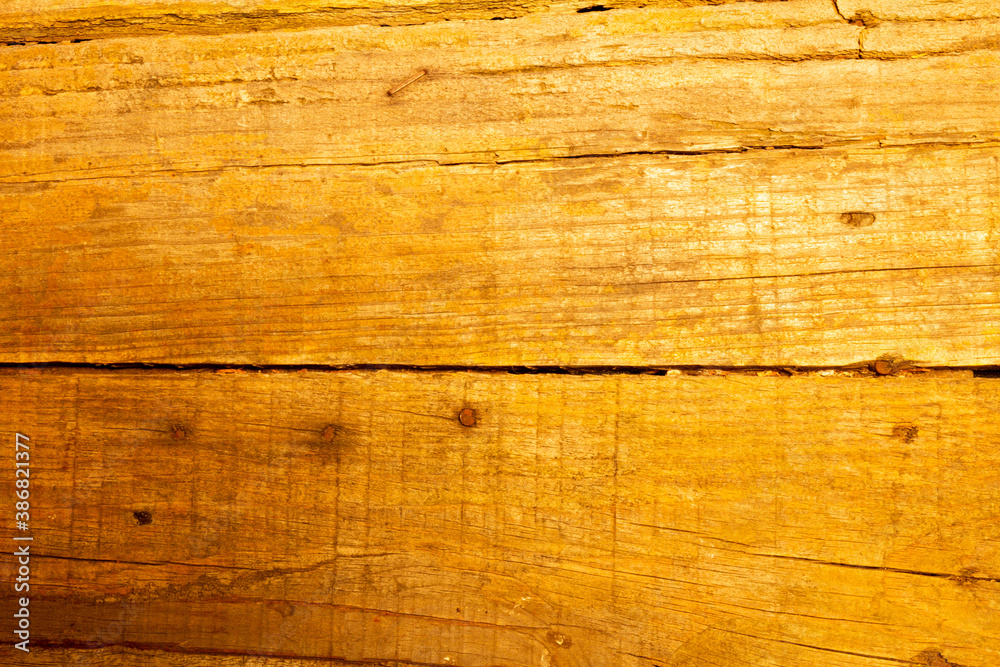 Excellent texture of an old wood table with cracks, nails and staples. Excellent texture of an old wood table with cracks, nails and staples.