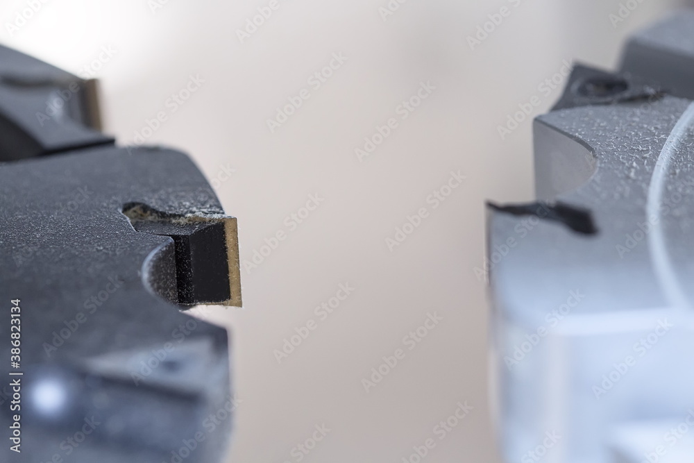 Cutters for wood processing. Closeup. A photo with a shallow depth of field. Woodworking tool. Cutters for wood processing. Closeup. A photo with a shallow depth of field. Woodworking tool.