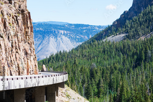 Scenic view of Chittenden viaduct on Grand Loop Road. Golden Gate Canyon surrounded by steep and colorful rocky walls in Yellowstone National Park