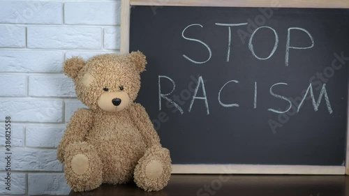Stop racism concept. Stop childish racism. photo