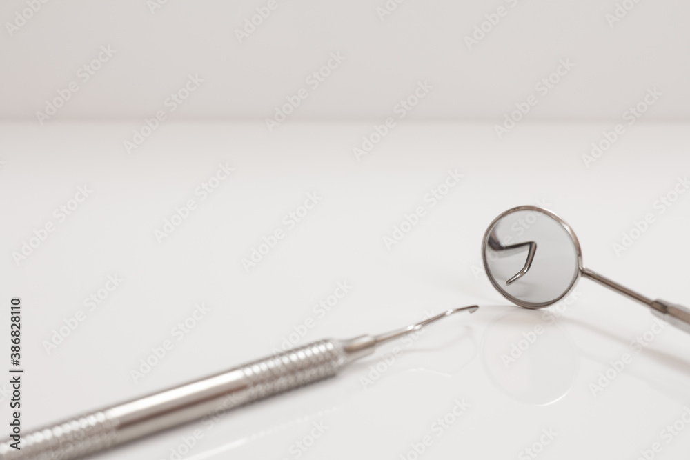 Dental instruments for teeth dental care on black background Dental instruments for teeth dental care on black background