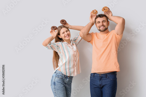 Young couple with sweet don...
