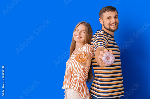 Young couple with sweet don...
