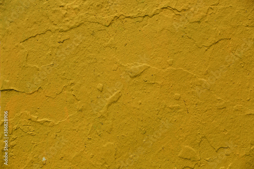 background of old yellow painted concrete wall