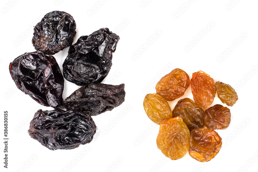 Raisins black and yellow isolated on white background Raisins black and yellow isolated on white background