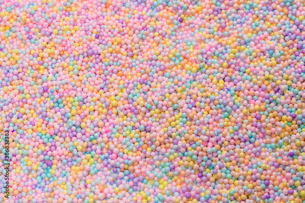 Purple, yellow, blue plastic balls. Purple, yellow, blue plastic balls.