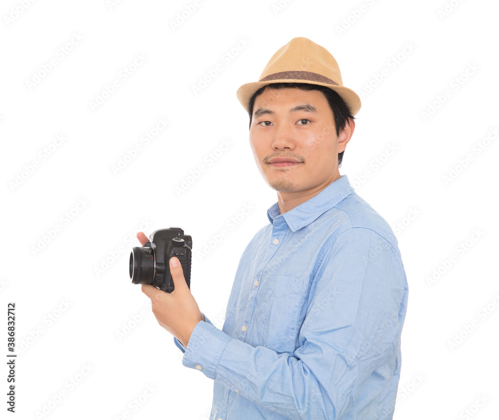 Male photographer holding DSLR camera in hand