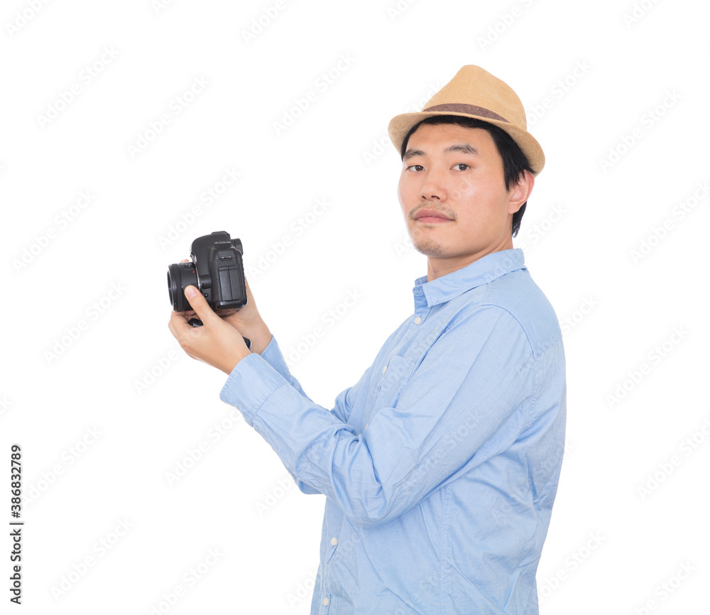 Male photographer holding DSLR camera in hand Male photographer holding DSLR camera in hand