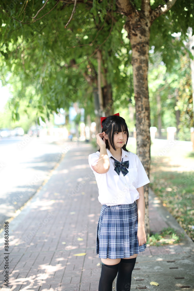 school girl looking with tree background school girl looking with tree background