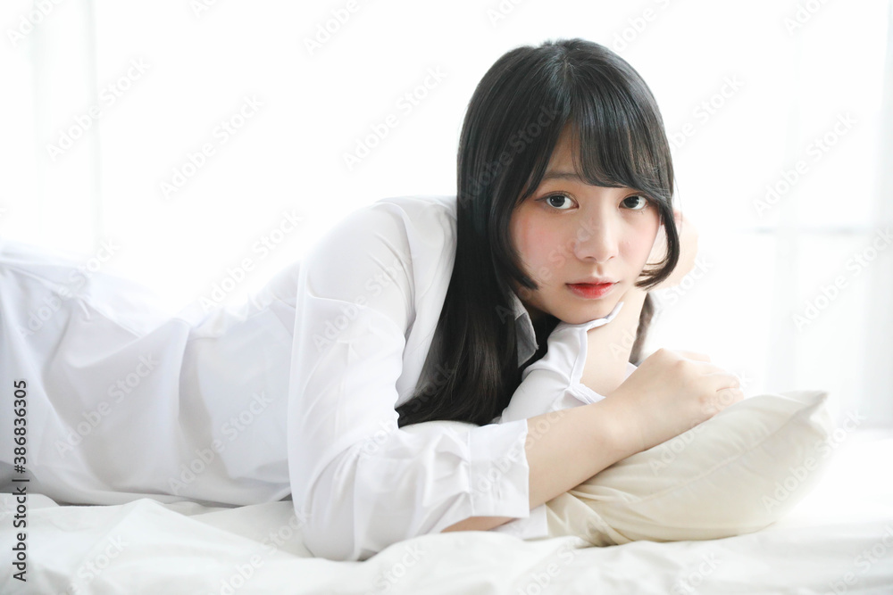 Portrait beautiful asian girl sleeping on bed in white room Portrait beautiful asian girl sleeping on bed in white room