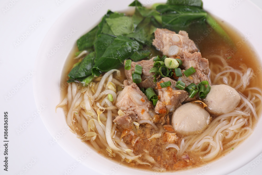Local Thai food , Noodle with meat ball and pork isolated in white background Local Thai food , Noodle with meat ball and pork isolated in white background