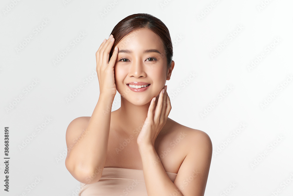 Beautiful young asian woman with clean fresh skin on white background, Face care, Facial treatment, Cosmetology, beauty and spa, Asian women portrait Beautiful young asian woman with clean fresh skin on white background, Face care, Facial treatment, Cosmetology, beauty and spa, Asian women portrait