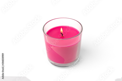 Pink aromatic candle isolated on white background.
