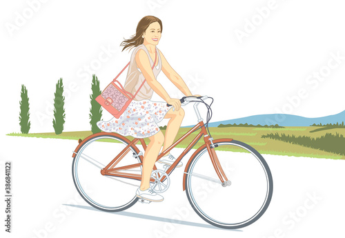 Fototapeta Naklejka Na Ścianę i Meble -  自転車に乗っている女性