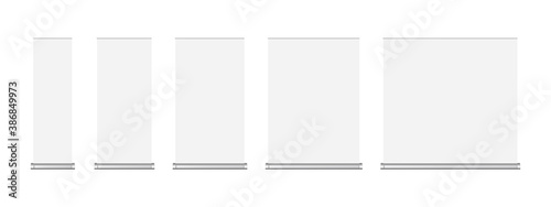Set of roll-up banner mockups isolated on white background. Blank vertical roll up posters for exhibition in different sizes. Vector illustration