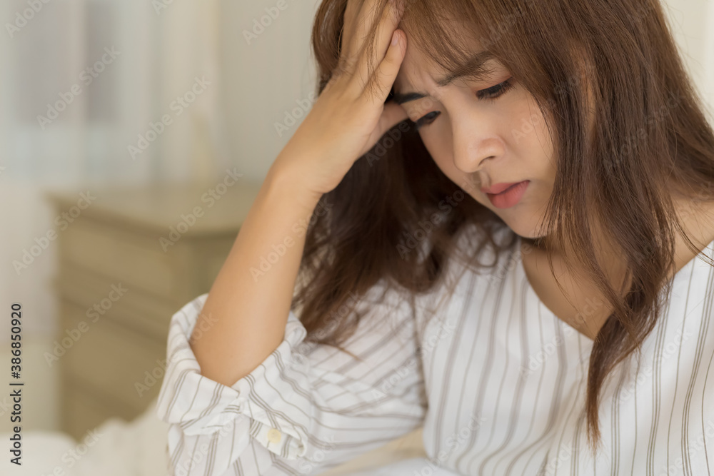 Young Asian women have headache Young Asian women have headache