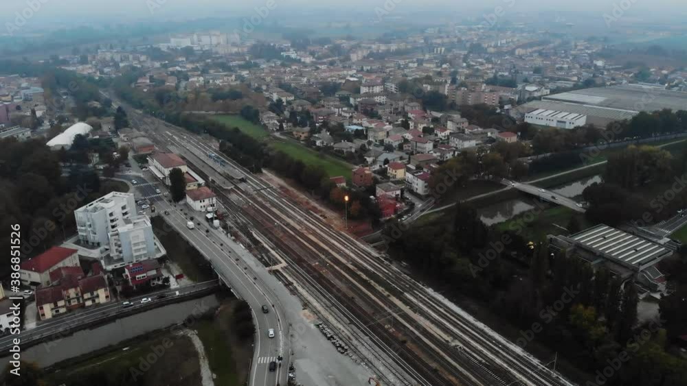 Aerial image of an Italian city crowded with fog in the evening. Aerial image of an Italian city crowded with fog in the evening.