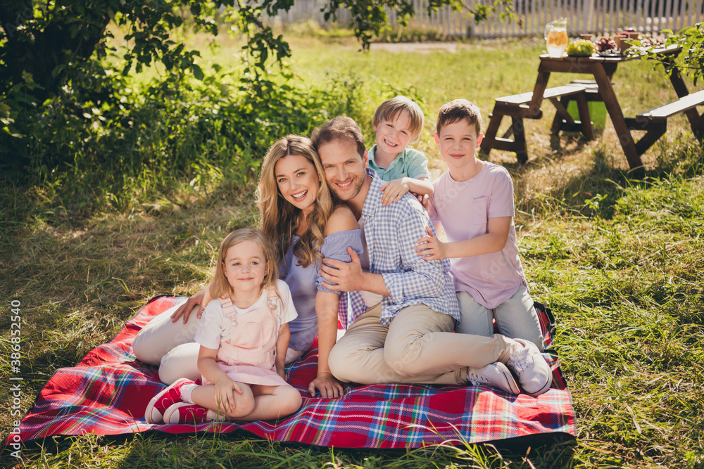Full length photo of loving full family gathering summer vacation