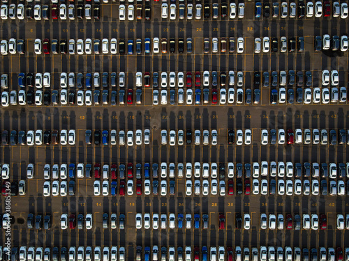 Top view of new cars in a parking lot ready for export or import