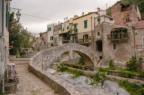 Zuccarello architectures and historical bridge, medieval town near Albenga, Liguria, Italy  photo