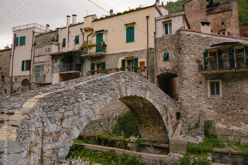 Zuccarello architectures and historical bridge, medieval town near Albenga, Liguria, Italy  photo