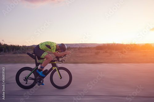 triathlon athlete riding a bike © .shock