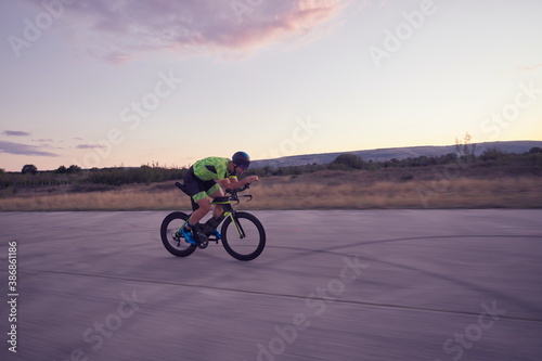 triathlon athlete riding a bike
