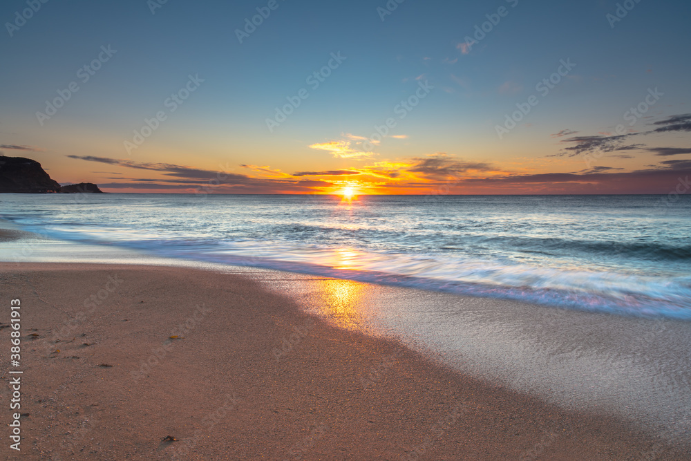 High cloud sunrise seascape