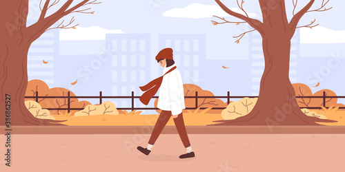 Young woman walking in park flat vector illustration. Teenage girl walks in the autumn park, the fresh air. Autumnal public park with leaf fall, trees, walkway, cityscape. Lifestyle and activity